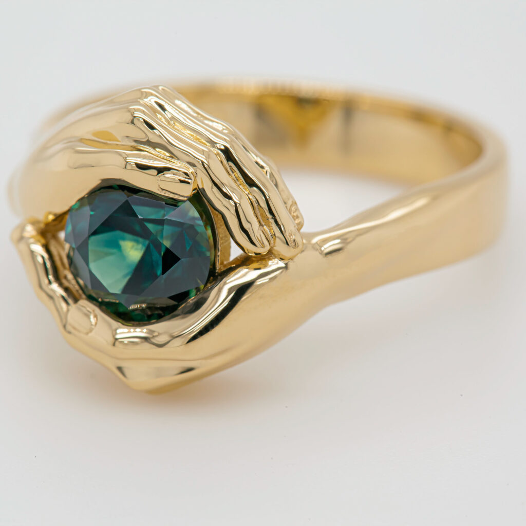 Yellow Gold Australian Parti Sapphire Ring With Hands Setting By World Treasure Designs