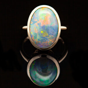 Australian Semi-Black Opal Ring Bezel Set in Yellow Gold by World Treasure Designs